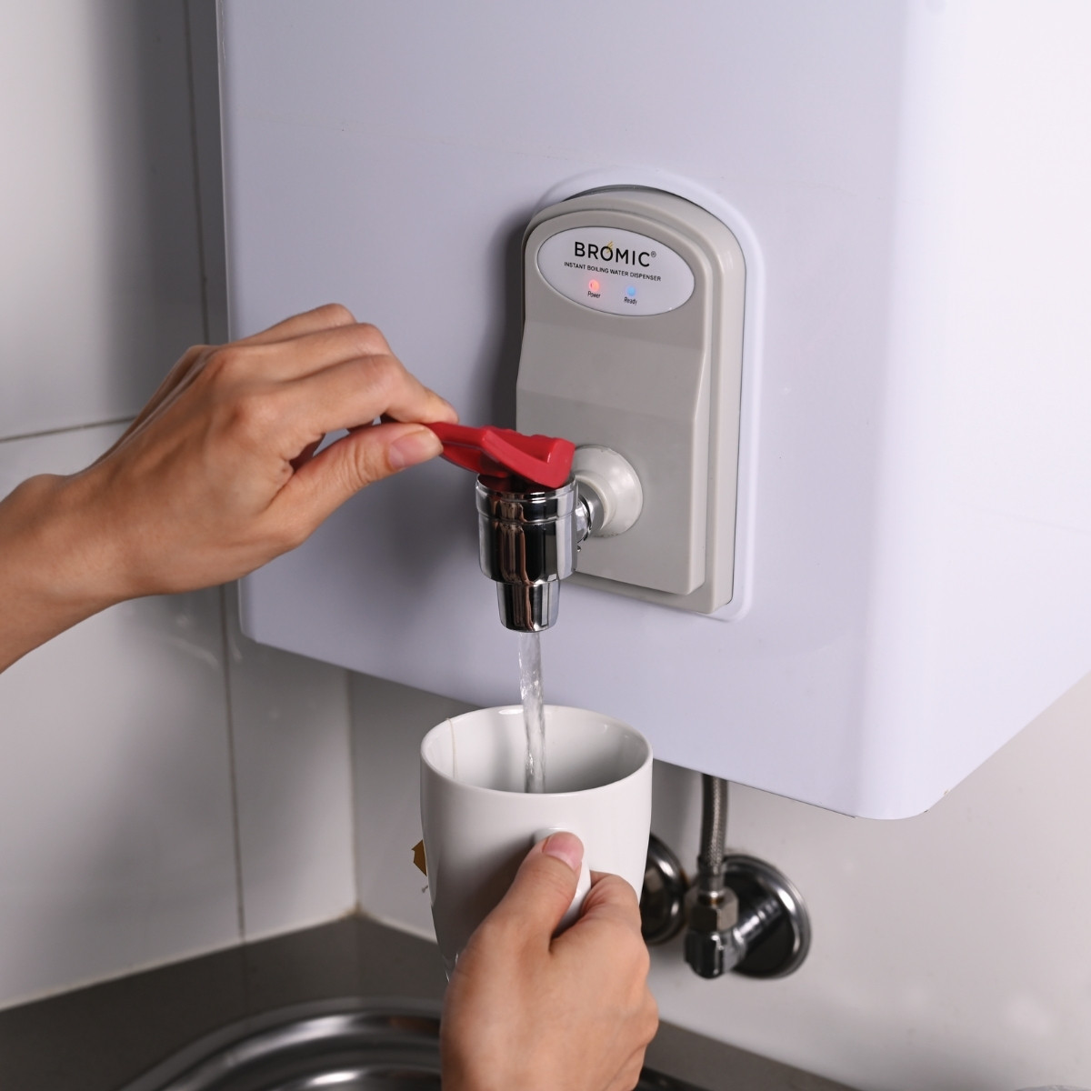 Instant boiling water dispenser on wall boiler